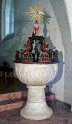 Gothic, stone baptismal font with a Baroque, wooden cover. XIV century and 1720. Poland. State after conservation.